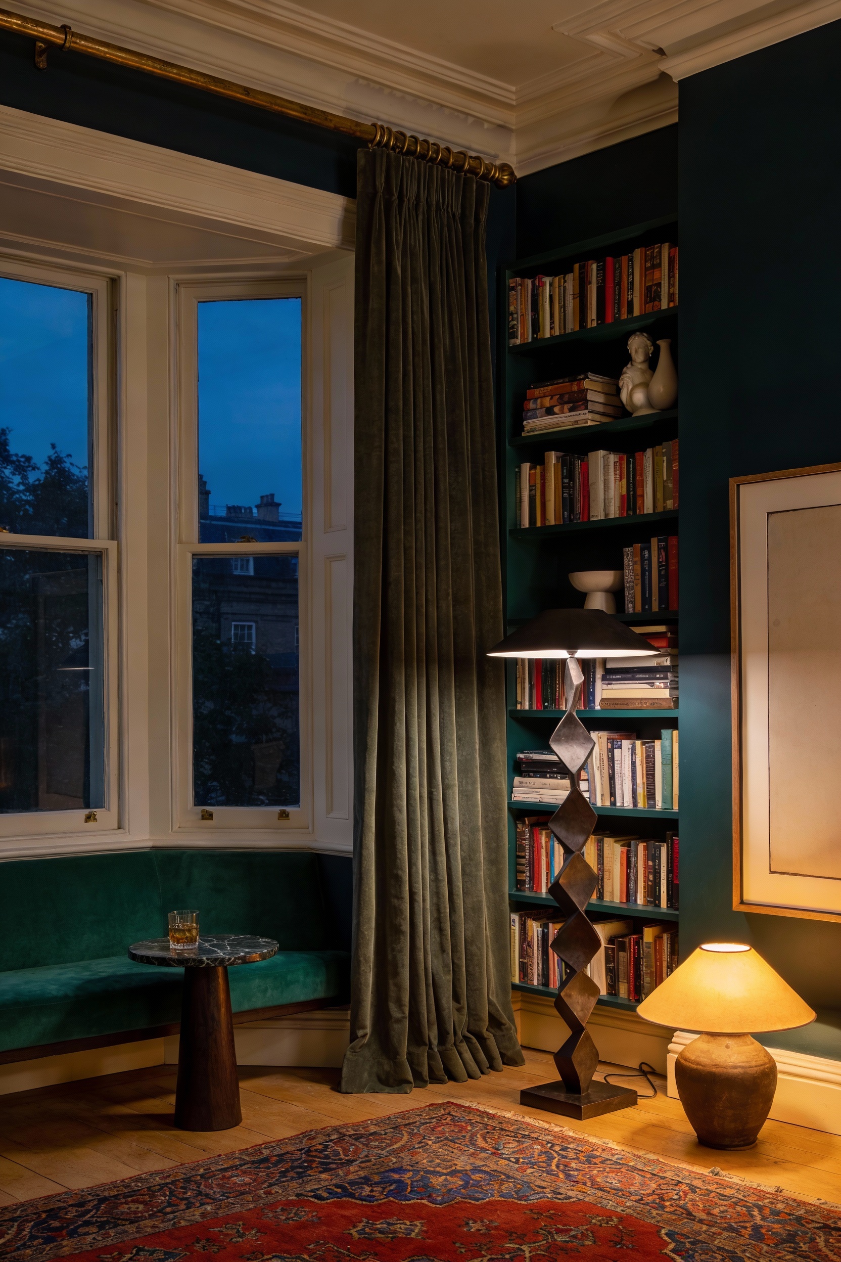 Moody wide corner-angle photorealistic library lounge anchored by a bay window: surrounding walls painted inky navy or f